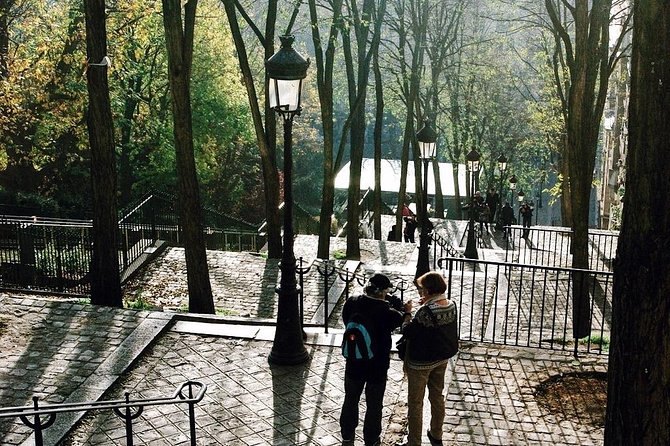 Lamplit steps and plane trees on the climb up the Butte Montmartre